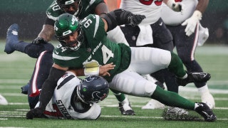 New York Jets defensive lineman Solomon Thomas sacks Houston Texans QB C.J. Stroud at MetLife Stadium in New Jersey. (Al Bello/Getty Images)