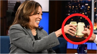 Kamala Harris goes full cringe drinking a beer with Stephen Colbert. (Credit: Scott Kowalchyk/CBS ©2024 CBS Broadcasting Inc. All Rights Reserved)