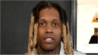 Rapper Lil Durk has been arrested on a conspiracy to commit murder-for-hire charge. What are the details of the case? (Credit: Getty Images)