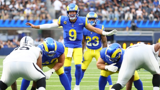 Los Angeles Rams QB Matthew Stafford makes a pre-snap adjustment vs. the Las Vegas Raiders at SoFi Stadium. (Joe Scarnici/Getty Images)
