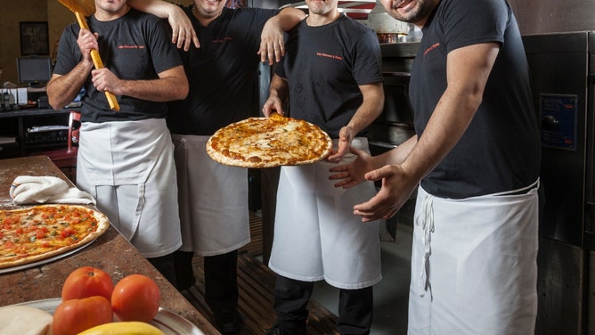 pizza employees beat up armed robber with his gun