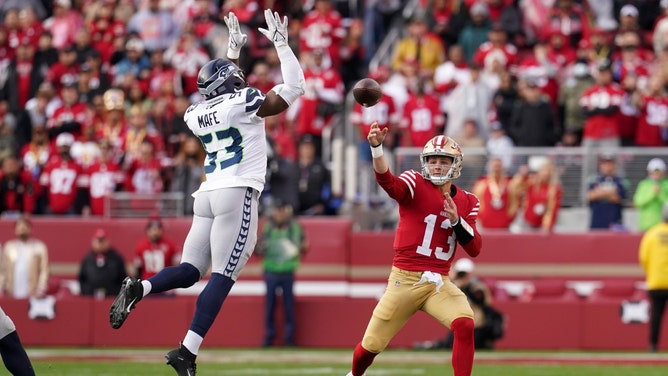 San Francisco 49ers QB Brock Purdy throw off his backfoot against Seattle Seahawks at Levi's Stadium. (Cary Edmondson-Imagn Images)