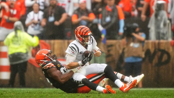 Cleveland Browns pass rusher Myles Garrett sacks Cincinnati Bengals QB Joe Burrow in NFL Week 1 last season. (Kareem Elgazzar/The Enquirer-USA TODAY NETWORK)