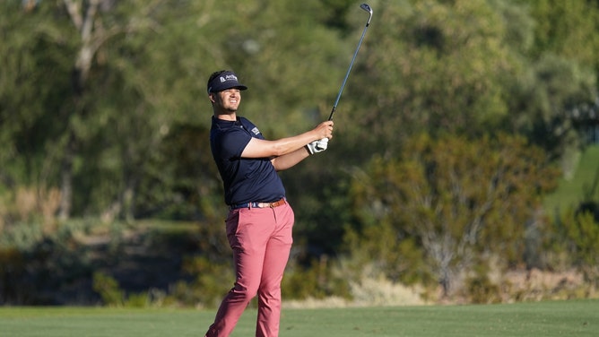 Beau Hossler takes his second shot from the fairway Hole No. 18 during the 2023 Shriners Children's Open at TPC Summerlin in Las Vegas. (Ray Acevedo-Imagn Images)