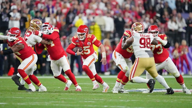 Kansas City Chiefs QB Patrick Mahomes scrambles vs. the San Francisco 49ers during overtime of Super Bowl LVIII at Allegiant Stadium in Las Vegas. (Kirby Lee-USA TODAY Sports)