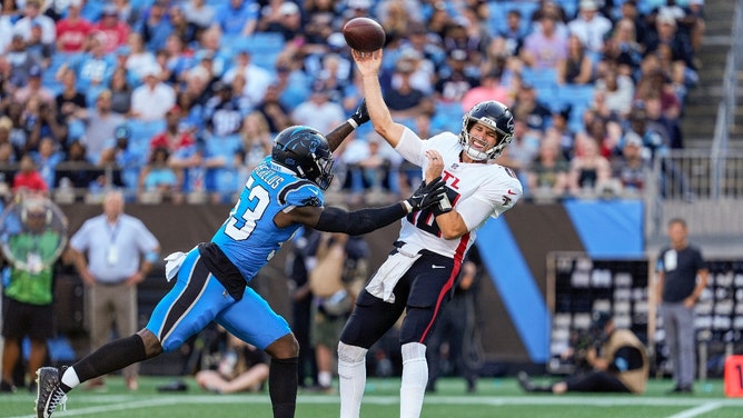 Carolina Panthers LB Claudin Cherelus pressures Atlanta Falcons QB Kirk Cousins at Bank of America Stadium in Charlotte. (Jim Dedmon-Imagn Images)