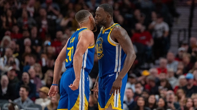 Golden State Warriors PG Stephen Curry and PF Draymond Green celebratevs. the Portland Trailblazers at Moda Center. (Stephen Brashear-Imagn Images)