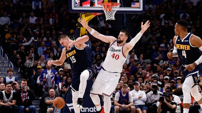 Los Angeles Clippers C Ivica Zubac collides with Denver Nuggets C Nikola Jokic at Ball Arena in Colorado. (Isaiah J. Downing-Imagn Images)