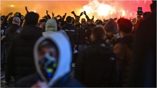 Maccabi Tel Aviv soccer fans were attacked in Amsterdam after a game against Ajax. Watch videos of the situation. (Credit: Getty Images)