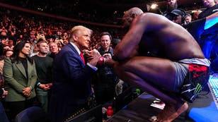 Jon Jones Hands Title Belt To Trump, Says He's A Proud 'Christian American'