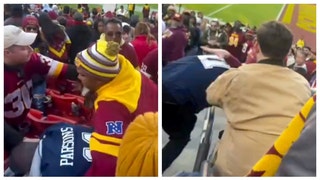 cowboys commanders fans fight in the stands