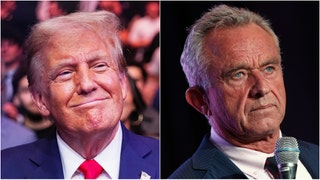 RFK Jr. is getting ruthlessly roasted over a photo with Donald Trump and McDonald's. Check out the reactions to the photo. (Credit: Getty Images)