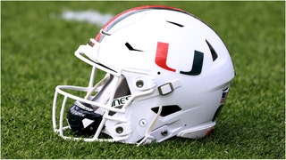 Miami player throws fan's phone after losing to Georgia Tech. (Credit: Getty Images)