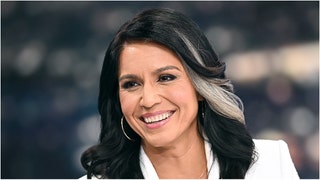 Watch videos of Tulsi Gabbard shooting guns. Watch viral videos of Gabbard with a variety of different firearms. (Credit: Getty Images)