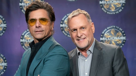 Internet bullies are seething at John Stamos today over not shaving his head to support Dave Coulier.