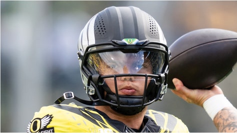 Oregon unveiled some awesome uniforms for the game against Maryland. What do the uniforms look like? Check out some photos. (Credit: Getty Images)