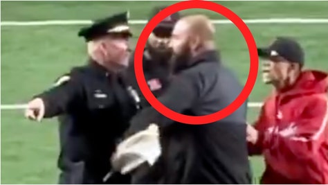 A Wisconsin police officer grabbed Nebraska coach Donovan Raiola after the Cornhuskers beat the Badgers. Watch a video of the incident. What happened? (Credit: Screenshot/X Video/https://x.com/MikeDiGiacomo/status/1860807713262891038/ with permission)