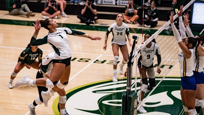 Malaya Jones of the Colorado State Rams jumps up to spike a ball against San Jose State during an October 3 match. Blaire Fleming is accused of helping Jones and the Rams target Spartans' teammate Brooke Slusser.