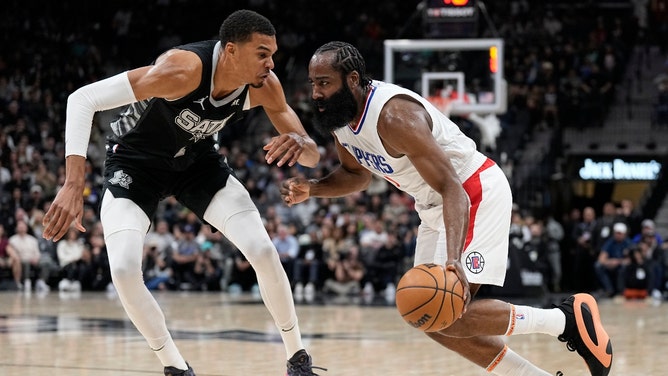 Los Angeles Clippers PG James Harden drives to the hoop on San Antonio Spurs big Victor Wembanyama at Frost Bank Center in Texas. (Scott Wachter-Imagn Images)