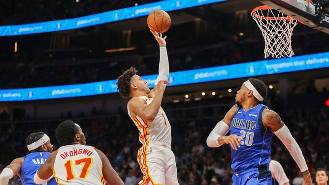 Atlanta Hawks PF Jalen Johnson shoots a floater over the Dallas Mavericks at State Farm Arena. (Brett Davis-USA TODAY Sports)