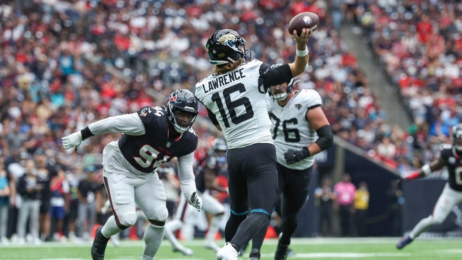 Jacksonville Jaguars QB Trevor Lawrence attempts vs. the Houston Texans at NRG Stadium in NFL Week 4. (Troy Taormina-Imagn Images)