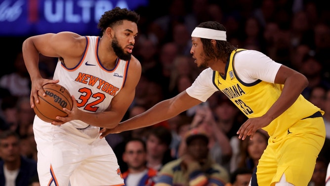 New York Knicks C Karl-Anthony Towns operates out of the triple threat against Indiana Pacers C Myles Turner at Madison Square Garden. (Brad Penner-Imagn Images)