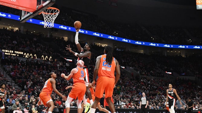 Portland Trail Blazers C Deandre Ayton takes a baby hook against the Oklahoma City Thunder at Moda Center. (Brian Murphy-Imagn Images)