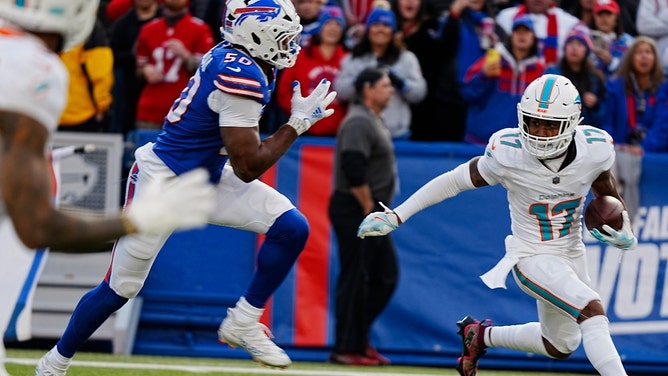 Buffalo Bills DE Greg Rousseau chases down Miami Dolphins WR Jaylen Waddle for the final tackle of their NFL Week 9 game at Highmark Stadium in New York. (Tina MacIntyre-Yee/Democrat and Chronicle-USA TODAY NETWORK via Imagn Images)