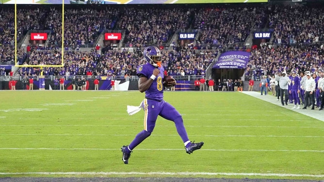 Baltimore Ravens QB Lamar Jackson scores a 2-point conversion vs. the Cincinnati Bengals at M&T Bank Stadium. (Mitch Stringer-Imagn Images)