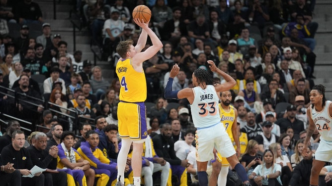 Los Angeles Lakers wing Dalton Knecht shoots a 3-pointer over the San Antonio Spurs at Frost Bank Center. (Daniel Dunn-Imagn Images)