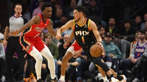 New Orleans Pelicans with Herbert Jones defending Phoenix Suns SG Devin Booker at Footprint Center in Arizona. (Mark J. Rebilas-Imagn Images)