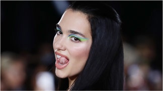 Music star Dua Lipa reportedly is engaged to boyfriend Callum Turner. What are the details? (Credit: Getty Images)