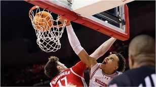 Wisconsin guard John Tonje throws down absurd dunk. (Credit: Getty Images)