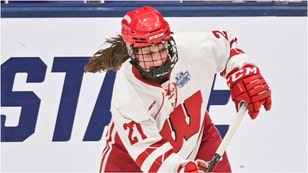 The Wisconsin Badgers men's and women's hockey teams unveiled awesome alternate uniforms for its upcoming Frozen Confines series at Wrigley Field. Check out what the uniforms look like. (Credit: Getty Images)