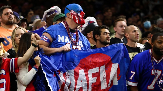 bills fans caught getting it on in the men's bathroom