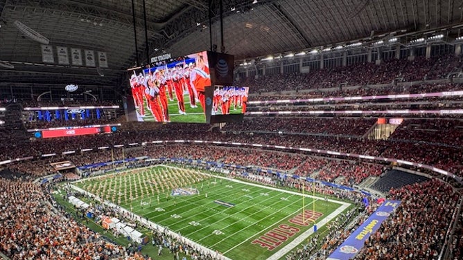 Texas and Ohio State fans enjoy the CFP Cotton Bowl on Friday night. Via: Trey Wallace