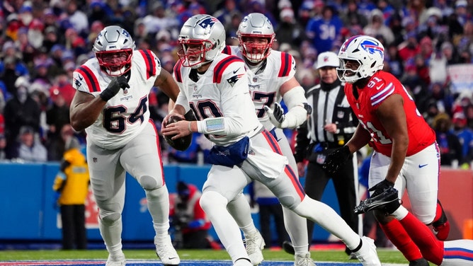 New England Patriots QB Drake Maye scrambling against the Buffalo Bills at Highmark Stadium in NFL Week 16. (Gregory Fisher-Imagn Images)