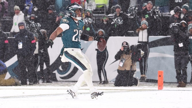 Philadelphia Eagles RB Saquon Barkley celebrates a touchdown against the Los Angeles Rams in the 2025 NFC divisional round game. (Photo credit: Bill Streicher-Imagn Images)