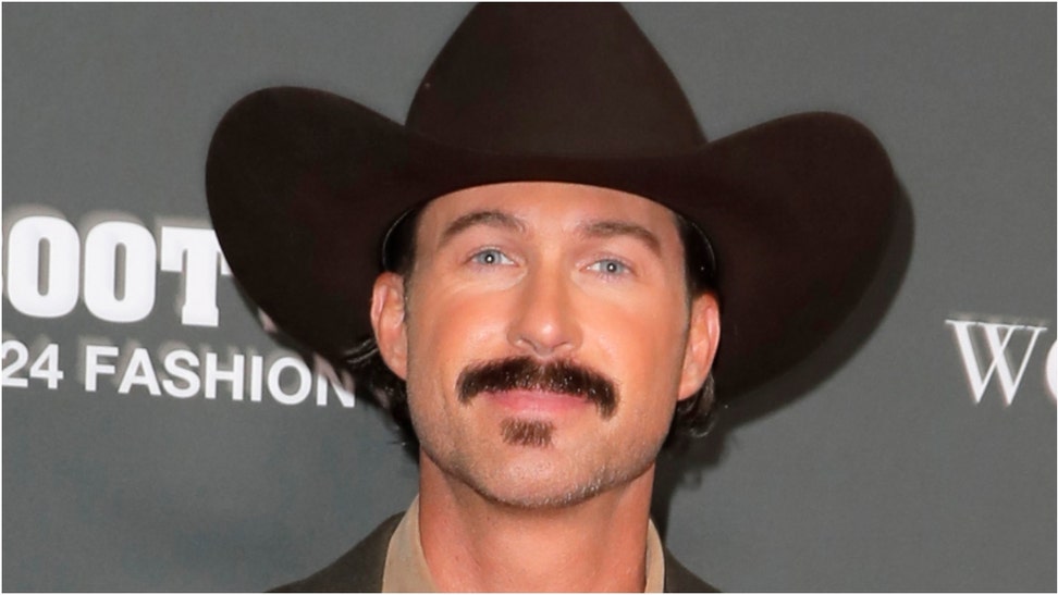 Country music superstar Riley Green was hospitalized after a hunting accident that resulted in a nail impaling his foot. What are the details? (Credit: Getty Images)