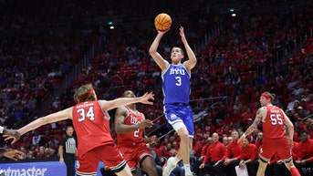 BYU Cougars PG Egor Demin shoots a floater over the Utah Utes at Jon M. Huntsman Center. (Photo credit: Rob Gray-Imagn Images)