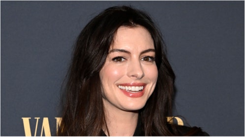 Actress Anne Hathaway is going viral after being shown on the Super Bowl broadcast. What are the reactions? (Credit: Getty Images)