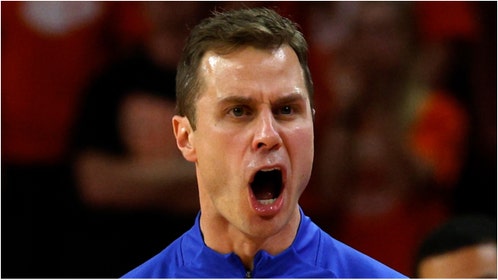 Jon Scheyer pushed a Clemson student during the team's upset loss to the Tigers. (Credit: Getty Images)