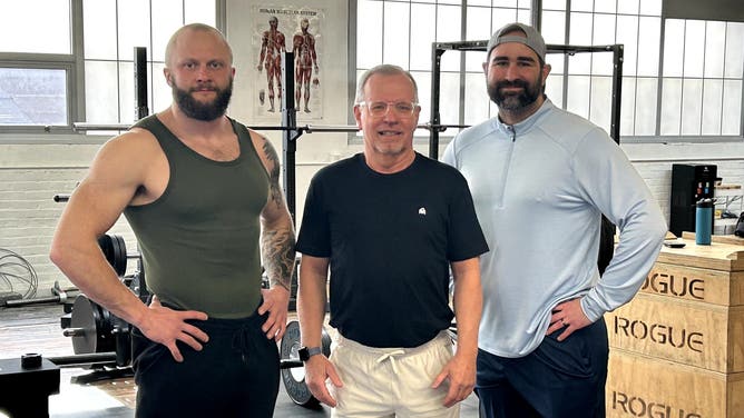 Sam McCue (left), personal trainer and founder of Cue Coaching, Tom Bish (center) Christian Pastor and above-the-knee amputee, and Dan Zaksheske, OutKick reporter