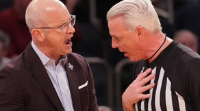 Connecticut coach Dan Hurley talks to the referee at Madison Square Garden.