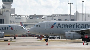 brazilian couple arrested throwing coffee at airport employee