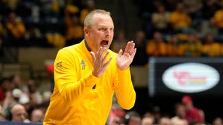 Indiana has hired former West Virginia head coach Darian DeVries