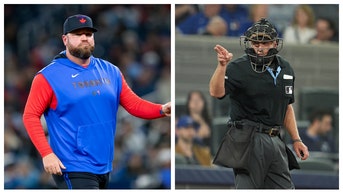 BLUE JAYS MANAGER JOHN SCHNEIDER UMPIRE