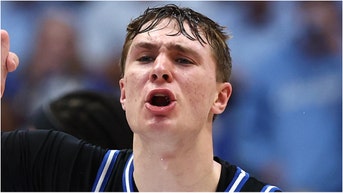 Duke star Cooper Flagg went down in the first half of the ACC Tournament against Georgia Tech. Watch a video of the moment it happened. (Photo by Jared C. Tilton/Getty Images)