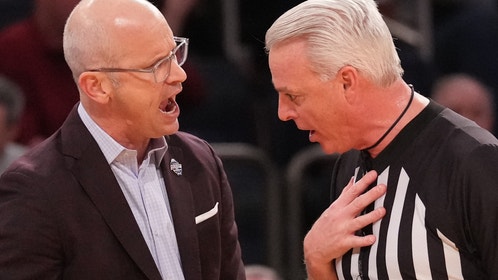 Connecticut coach Dan Hurley talks to the referee at Madison Square Garden. 