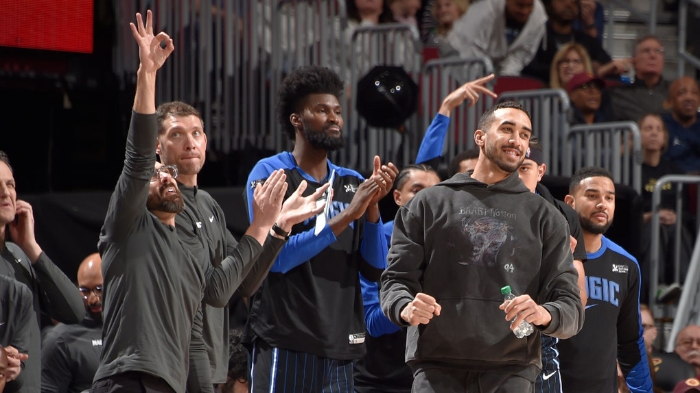 busty fan goes viral during hawks and magic play-in game
